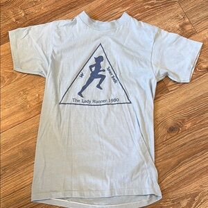 The Lady Runner 1980 Light Blue T-Shirt
